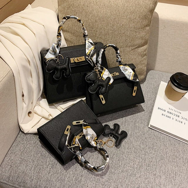 2021 New Ladies Fashion Luxury Leather Hand Bag With Doll High Quality Shoulder Strap Top Handle Bag Vintage Pinko Brand Za Bag