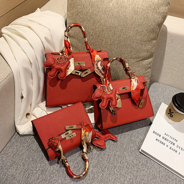 2021 New Ladies Fashion Luxury Leather Hand Bag With Doll High Quality Shoulder Strap Top Handle Bag Vintage Pinko Brand Za Bag