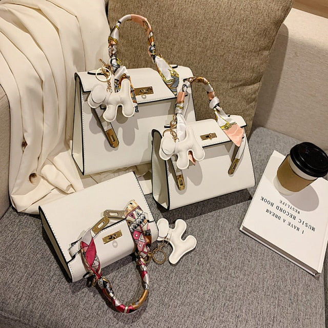 2021 New Ladies Fashion Luxury Leather Hand Bag With Doll High Quality Shoulder Strap Top Handle Bag Vintage Pinko Brand Za Bag